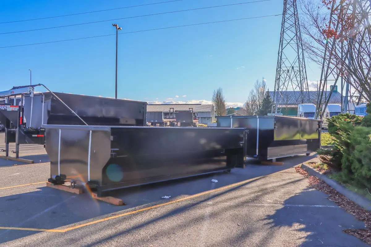Roll-off dumpster ready for waste disposal at job site for Demolition Dumpster Rental in Farmington